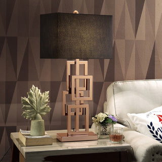 Bronze table lamp luxury — geometric home lighting side angle