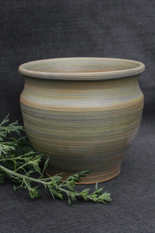 antique clay pot handmade artisan ceramic pot smoke firing finish close-up