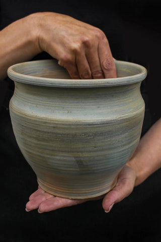 antique clay pot handmade artisan ceramic pot smoke firing finish side view