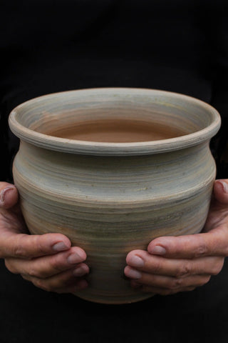 antique clay pot handmade artisan ceramic pot smoke firing finish angle view