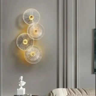 Sunburst sconce close-up gold glass rays detail