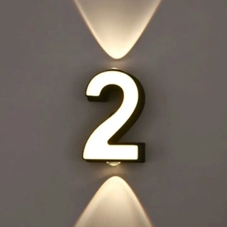 Illuminated number sconce installed – urban modern black white accent