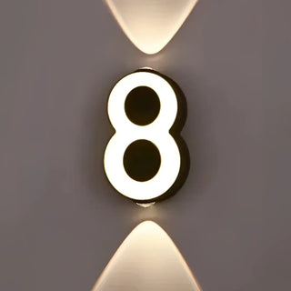 Black illuminated number wall sconce – urban contemporary decor