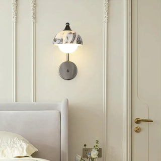 Black marble wall light opal globe pendant close-up