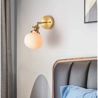 Ceramic brass wall light E27 – warm white LED close-up