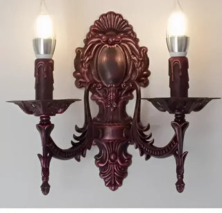 Castle wall sconce dual candle black decorative close-up