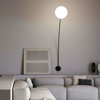 Bow-shape wall sconce close-up geometric acrylic detail