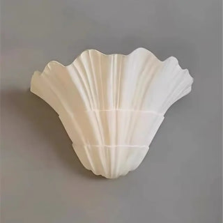 Seashell shaped wall sconce white close-up detail