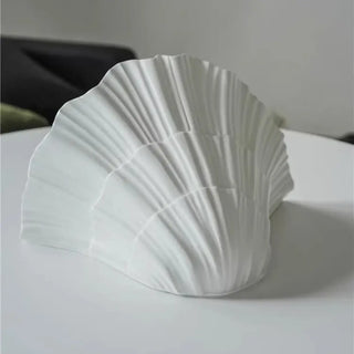 White shell wall sconce LED warm 3000K installed view