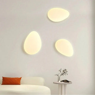 URD white organic stone wall sconce installed bedroom