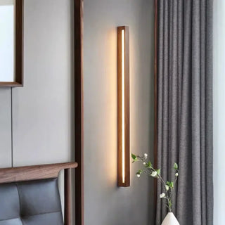 Zen inspired wall sconce brown wood acrylic side view
