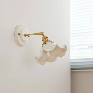 Flower shaped ceramic wall light close-up – golden white diffuser pattern