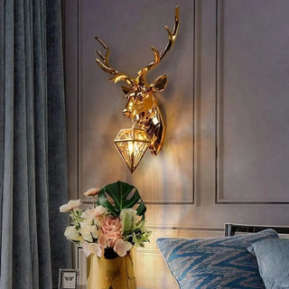 Gold deer wall lamp – close-up aluminum acrylic fixture