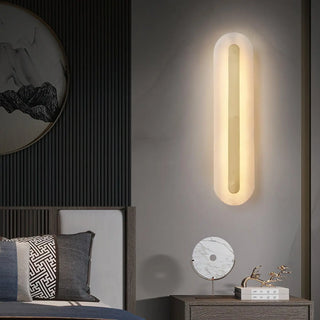 Long gold marble wall sconce LED – bedside warm light front view