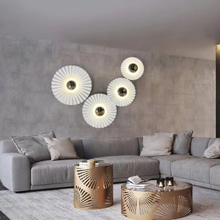 White circular wall sconce – close-up glass aluminum