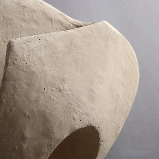 Natural stone cocoon sconce – beige close-up art deco