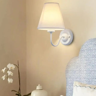 Modern fabric wall sconce with warm diffused light, contemporary design