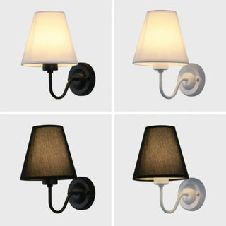 Contemporary fabric wall light detail — soft warm glow sconce