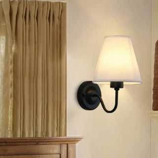 Contemporary fabric wall sconce with soft ambient light, modern interior