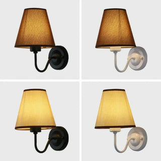 Contemporary fabric wall lamp close-up — warm diffused light