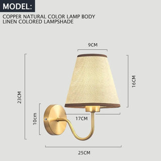 Contemporary fabric wall sconce installed — soft warm ambient glow