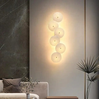 Sconcer textured glass sconce installed – light shadow play