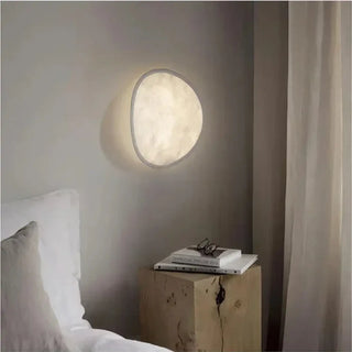 Soft half moon wall sconce in white acrylic – front view
