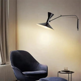 Adjustable arm wall light, industrial black metal close-up detail