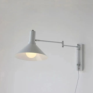 STUDIO articulated arm wall sconce with conical shade