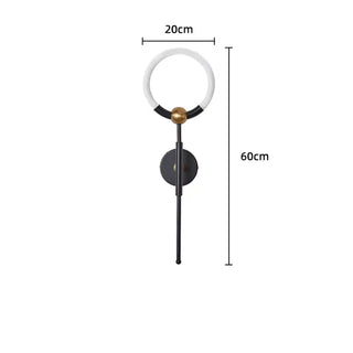 Ring wall sconce installed view gold bedroom