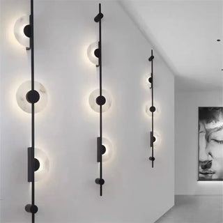 Contemporary wall sconce LED circles gold finish detail