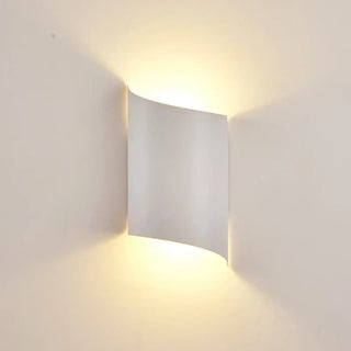 Black 2-light wall sconce installed in modern corridor