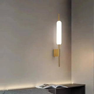 SUTURUS elegant vertical LED wall sconce gold finish