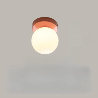 Puffo wall sconce front view rounded shade 3000K warm