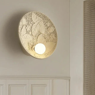 Resin glass wall sconce close-up warm 3000K diffused