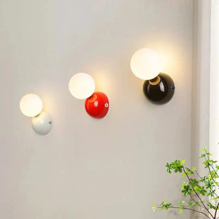 Sotor LED wall sconce bedroom setting