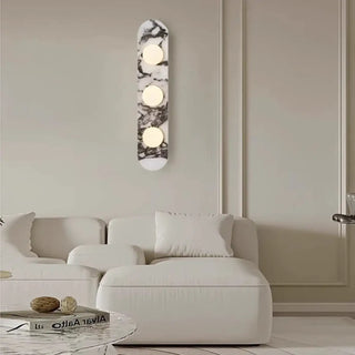 White marble wall sconce L 60cm installed in luxury interior