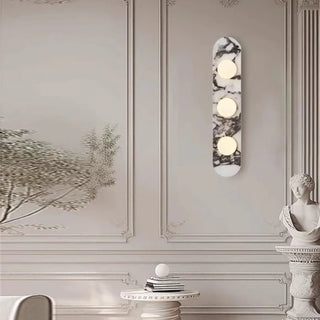 MABRE wall sconce close-up white marble and metal texture