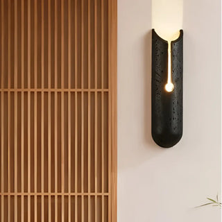 TURALIE minimalist stone wall light installed living room