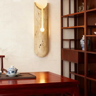 TURALIE sculpted stone wall sconce ambient glow