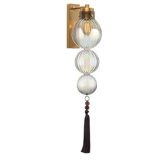 Transparent glass sconce close-up blue colour play