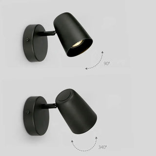 Adjustable sconce installed view black bedroom