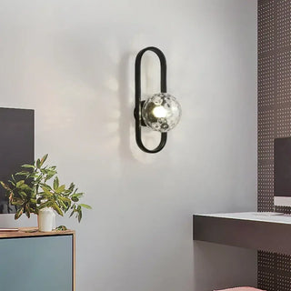 Oval gold wall sconce installed – white globe E27 3000K indoor