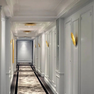 Moon effect gold wall light LED dimmable side view