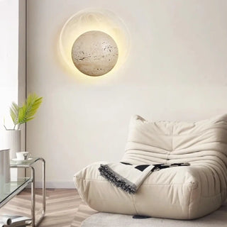 Stone round wall sconce close-up natural texture