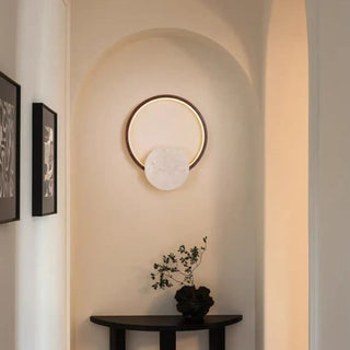 Sogori round stone metal LED wall sconce – front view