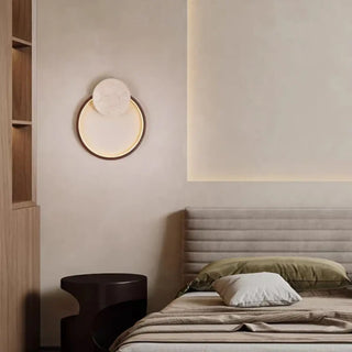 Sogori round wall sconce installed – warm light play
