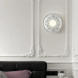 Resin wall sconce installed view beige living room