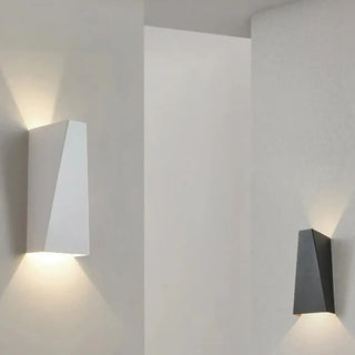 TARSEDE gold triangle wall sconce installed living room