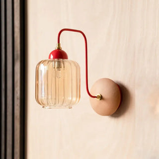 MALINA wall sconce close-up clear glass and wood texture